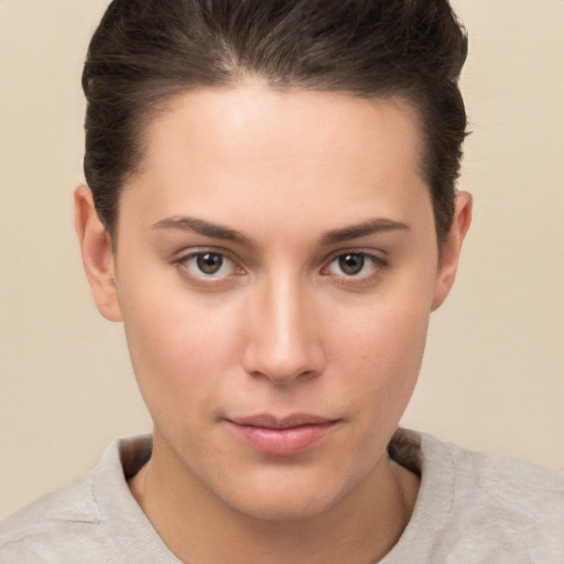 Neutral white young-adult female with short  brown hair and brown eyes