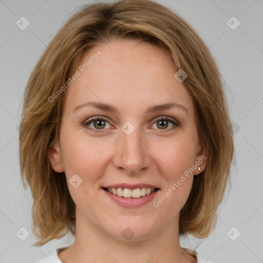 Joyful white young-adult female with medium  brown hair and green eyes