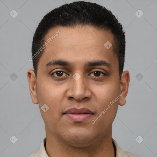 Joyful latino young-adult male with short  black hair and brown eyes