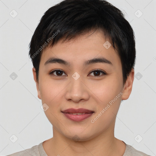 Joyful asian young-adult female with short  black hair and brown eyes