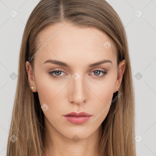 Neutral white young-adult female with long  brown hair and brown eyes