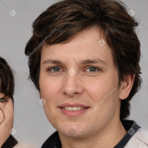 Joyful white young-adult male with medium  brown hair and brown eyes