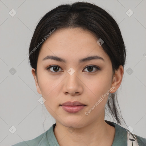 Neutral asian young-adult female with medium  brown hair and brown eyes