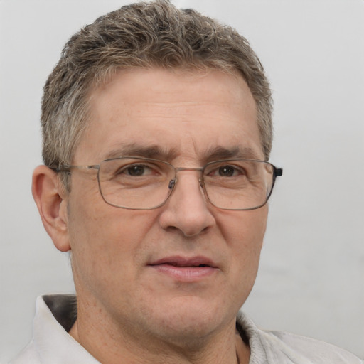 Neutral white middle-aged male with short  brown hair and brown eyes