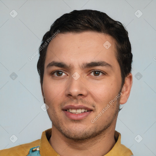 Joyful white young-adult male with short  black hair and brown eyes