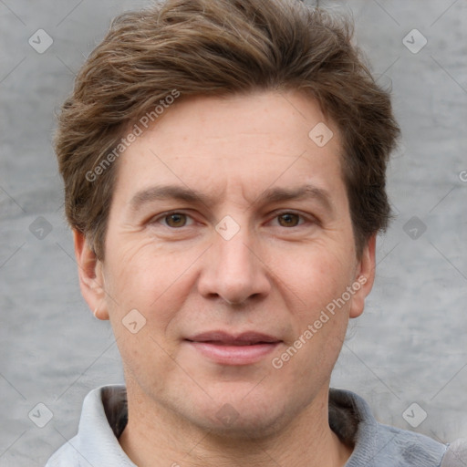 Joyful white adult male with short  brown hair and grey eyes