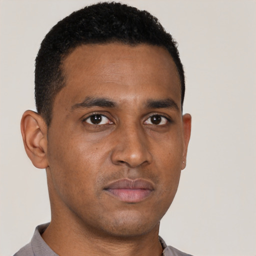 Neutral black young-adult male with short  black hair and brown eyes
