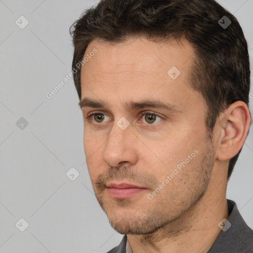 Neutral white adult male with short  brown hair and brown eyes