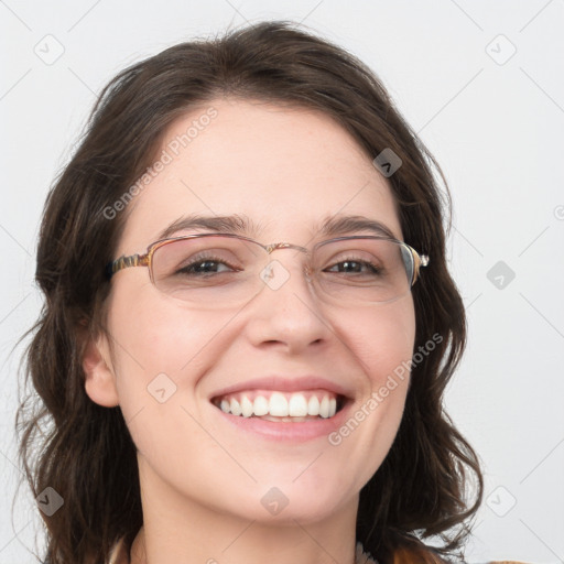 Joyful white young-adult female with medium  brown hair and blue eyes