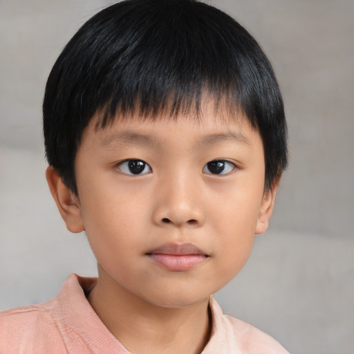Neutral asian child male with short  brown hair and brown eyes