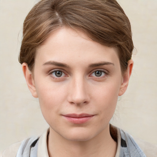 Neutral white young-adult female with short  brown hair and grey eyes