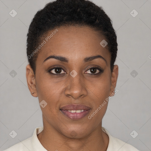 Joyful black young-adult female with short  black hair and brown eyes