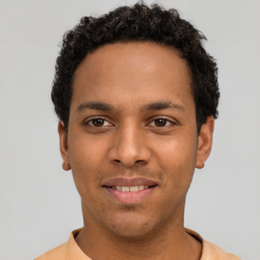 Neutral latino young-adult male with short  brown hair and brown eyes
