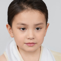 Joyful white child female with short  brown hair and brown eyes