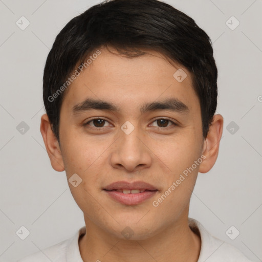 Joyful white young-adult male with short  black hair and brown eyes