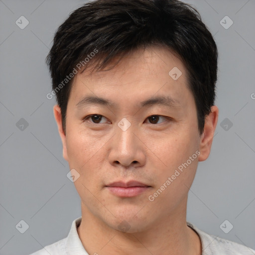 Neutral asian young-adult male with short  black hair and brown eyes