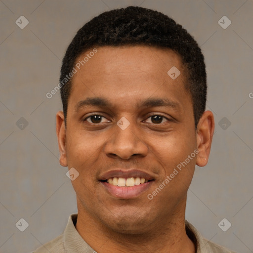Joyful latino young-adult male with short  black hair and brown eyes
