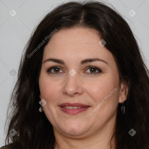 Joyful white adult female with long  brown hair and brown eyes