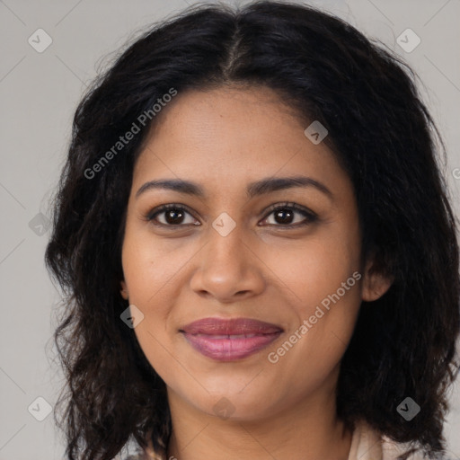 Joyful latino young-adult female with long  brown hair and brown eyes