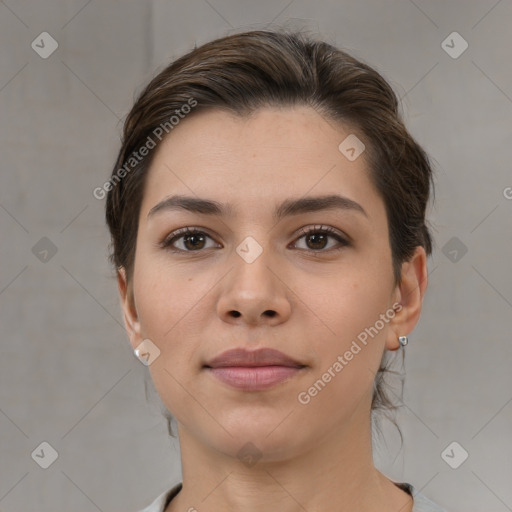 Neutral white young-adult female with medium  brown hair and brown eyes