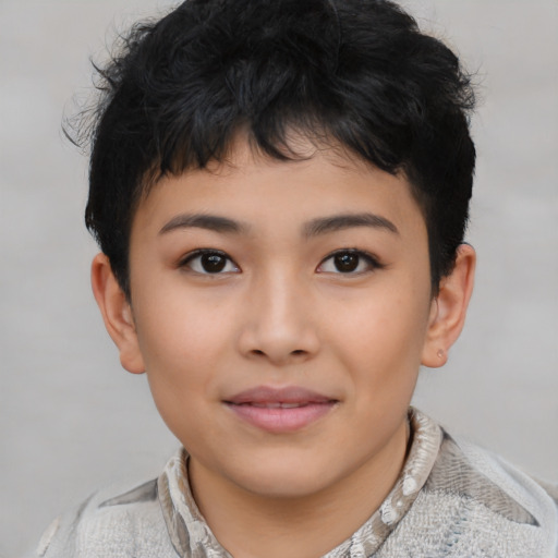 Joyful asian child female with short  brown hair and brown eyes