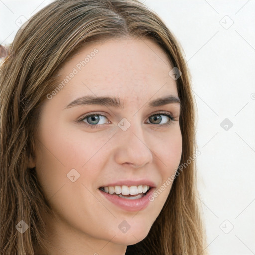 Joyful white young-adult female with long  brown hair and green eyes