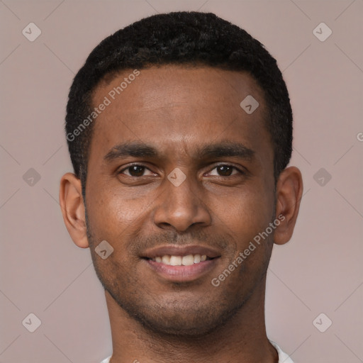 Joyful black young-adult male with short  brown hair and brown eyes