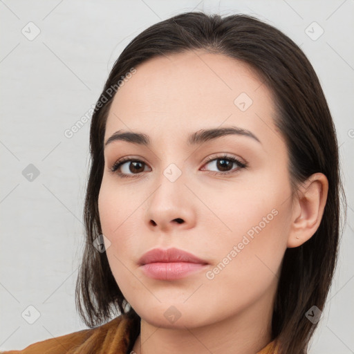 Neutral white young-adult female with long  brown hair and brown eyes