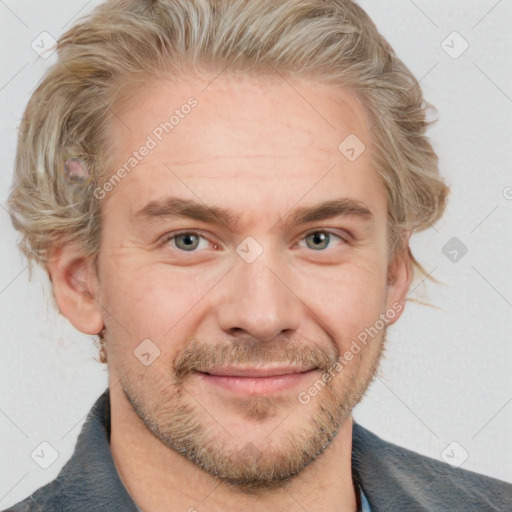 Joyful white adult male with short  brown hair and grey eyes