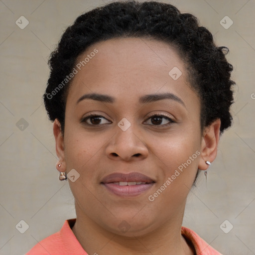 Joyful latino young-adult female with short  brown hair and brown eyes