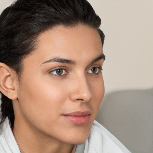 Neutral white young-adult female with medium  brown hair and brown eyes