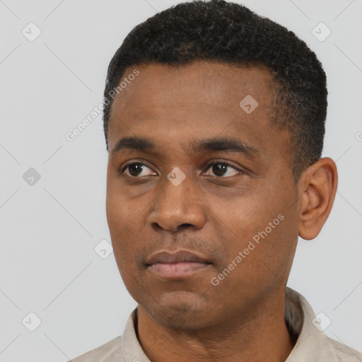 Neutral black young-adult male with short  black hair and brown eyes