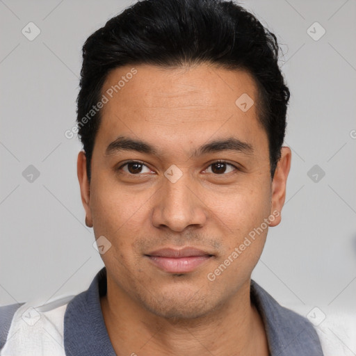 Joyful white young-adult male with short  black hair and brown eyes