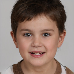 Joyful white child male with short  brown hair and brown eyes