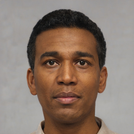 Neutral black young-adult male with short  black hair and brown eyes