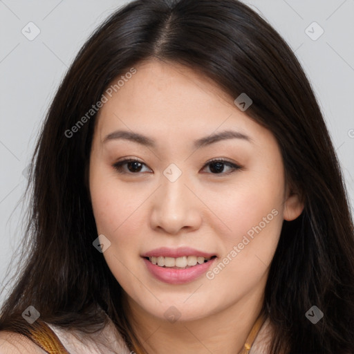 Joyful asian young-adult female with long  brown hair and brown eyes