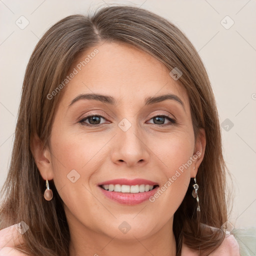 Joyful white young-adult female with long  brown hair and grey eyes