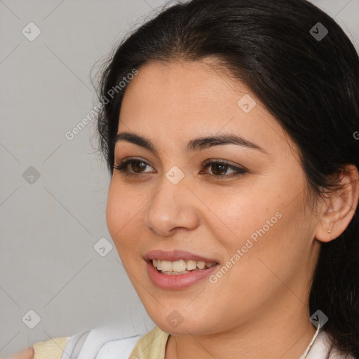 Joyful white young-adult female with long  brown hair and brown eyes