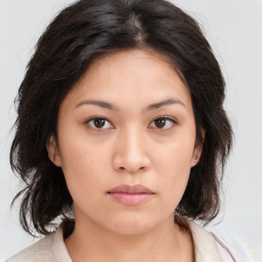Neutral asian young-adult female with medium  brown hair and brown eyes