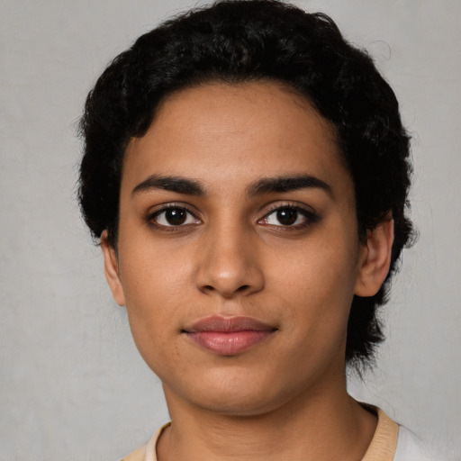 Neutral latino young-adult female with short  black hair and brown eyes