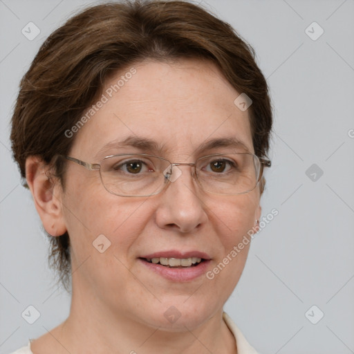 Joyful white adult female with short  brown hair and grey eyes