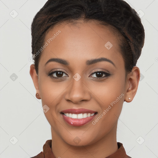 Joyful latino young-adult female with short  brown hair and brown eyes