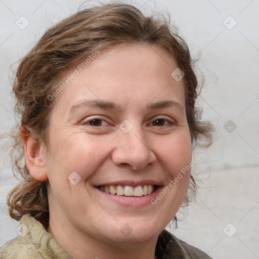 Joyful white adult female with medium  brown hair and blue eyes