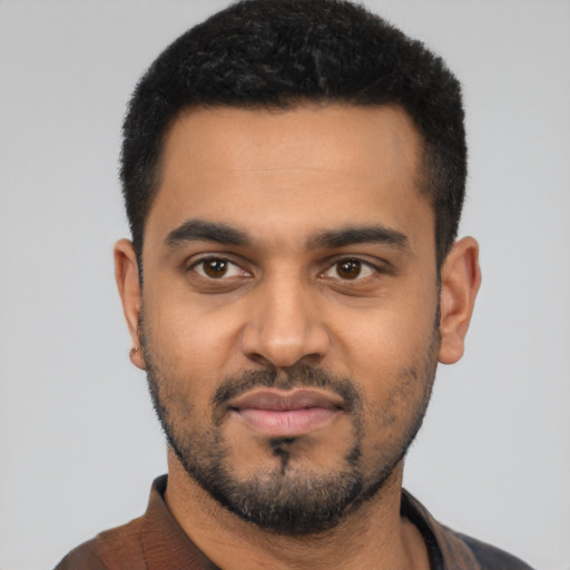 Neutral black young-adult male with short  black hair and brown eyes