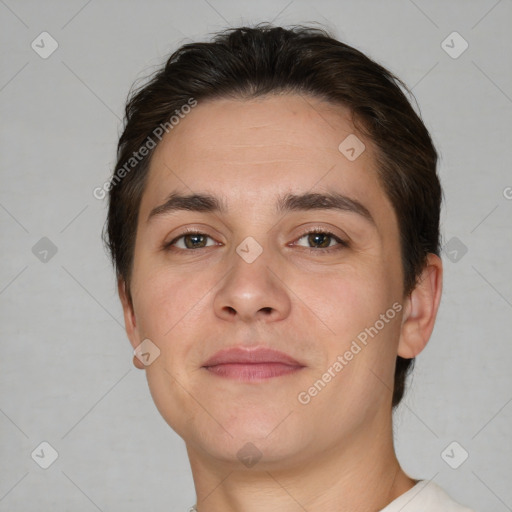 Joyful white young-adult male with short  brown hair and brown eyes