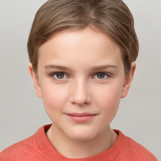 Joyful white child female with short  brown hair and grey eyes