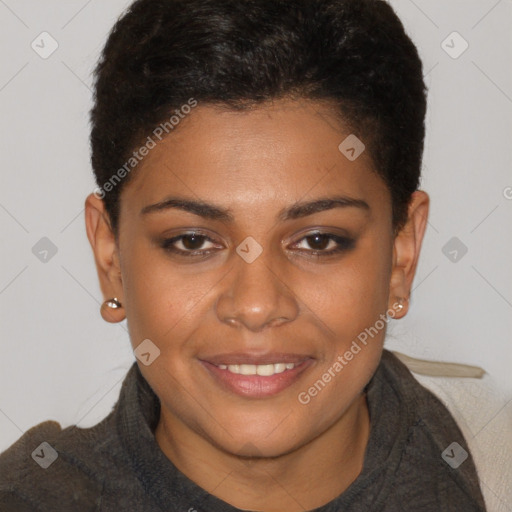 Joyful black young-adult female with short  brown hair and brown eyes