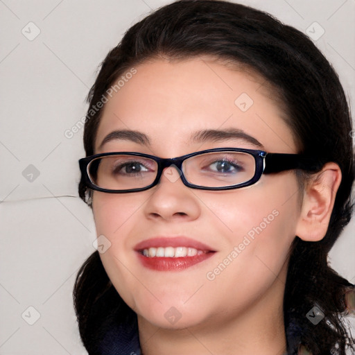 Joyful white young-adult female with medium  black hair and brown eyes