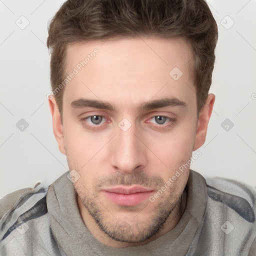 Neutral white young-adult male with short  brown hair and grey eyes