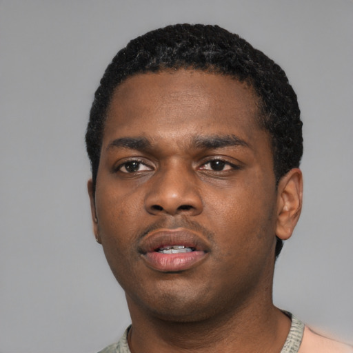 Neutral black young-adult male with short  black hair and brown eyes